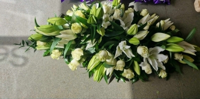 rose and lily casket spray (white)