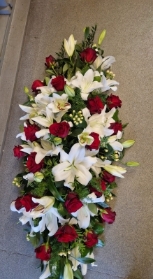 rose and lily casket spray