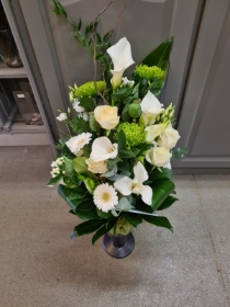 white and green tied sheaf
